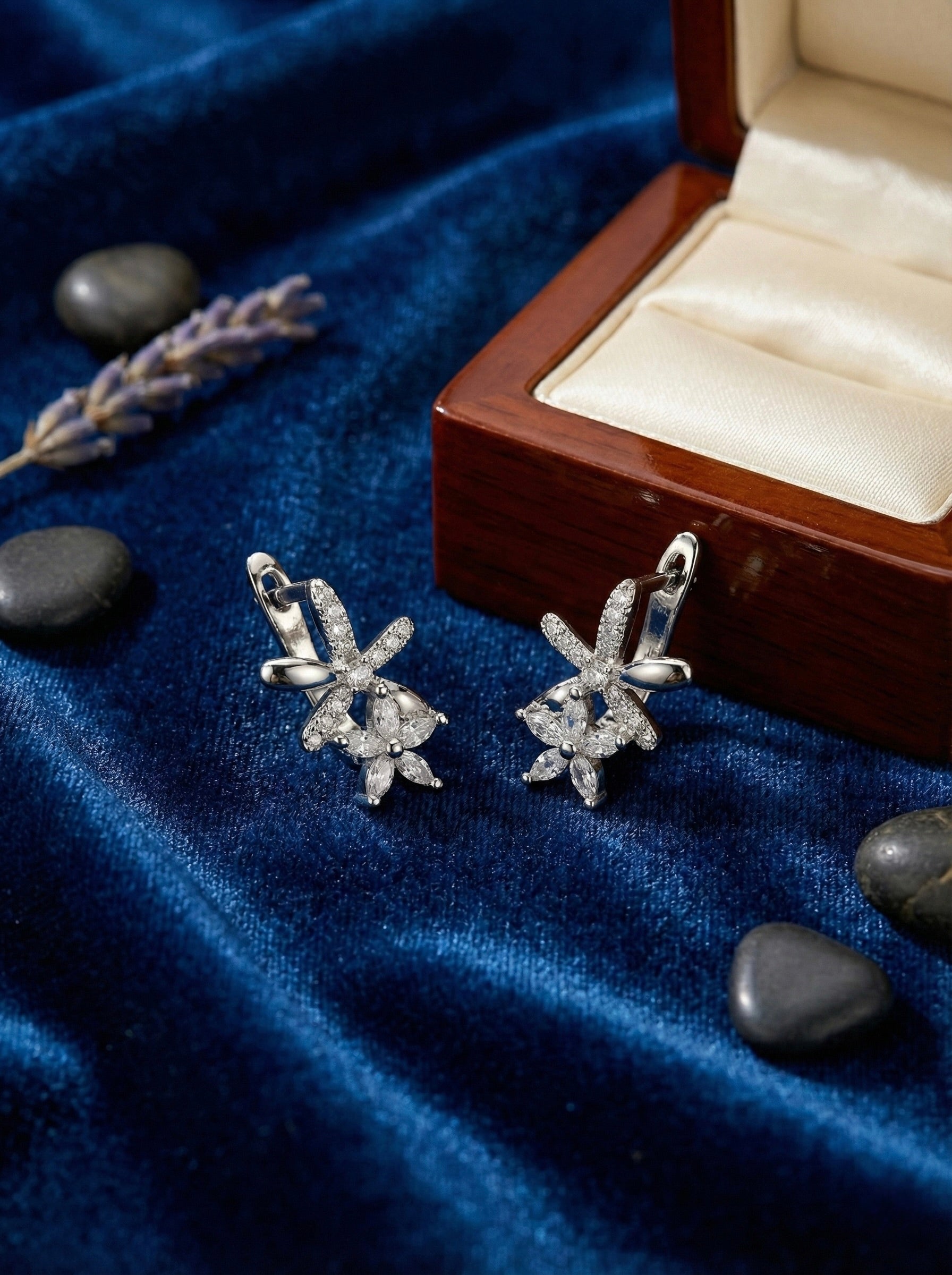 Silver floral crystal hoop earrings on model for daily elegance