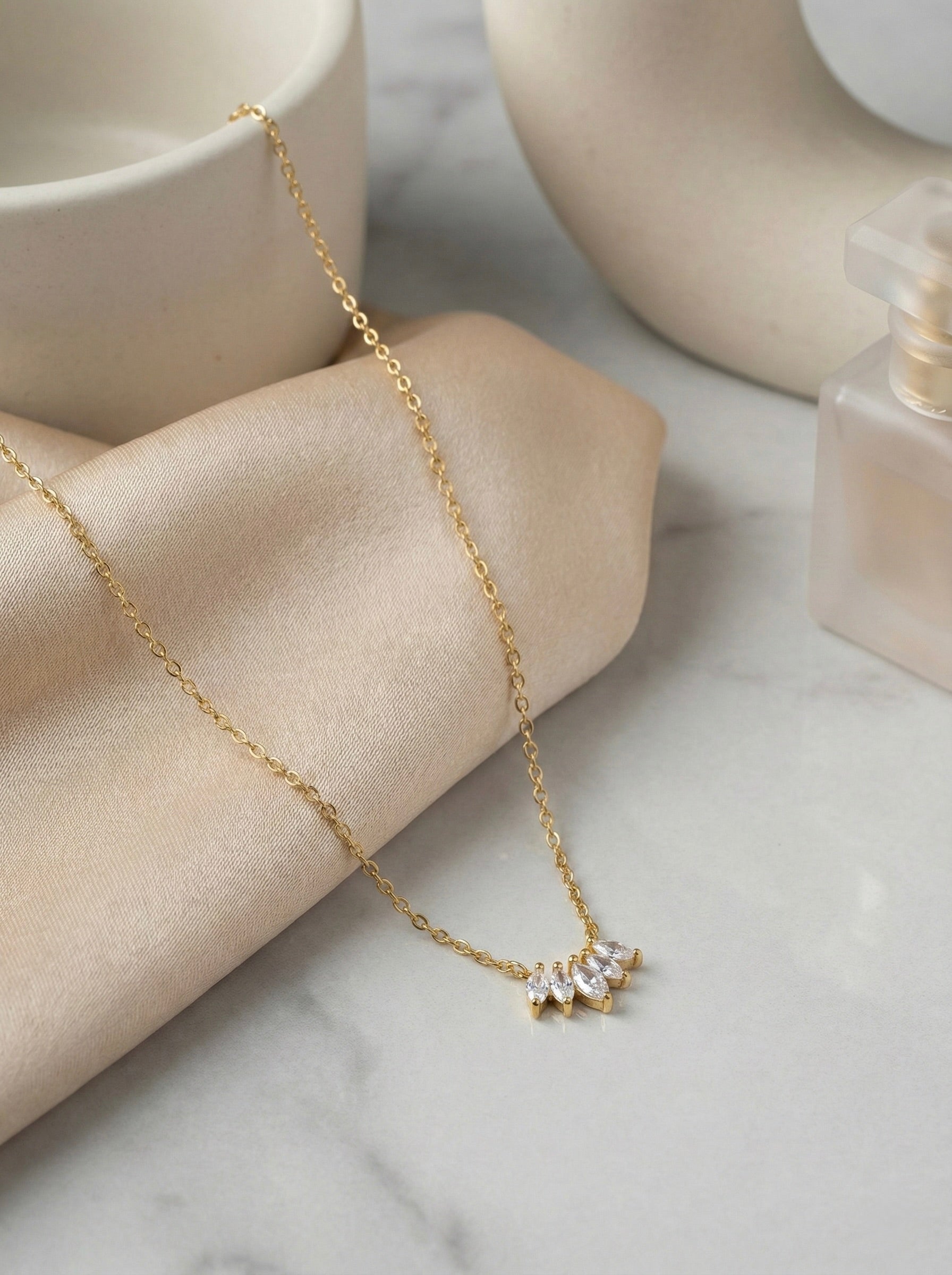 Close-up of lunea bloom CZ cluster bloom pendant necklace with sparkling stones