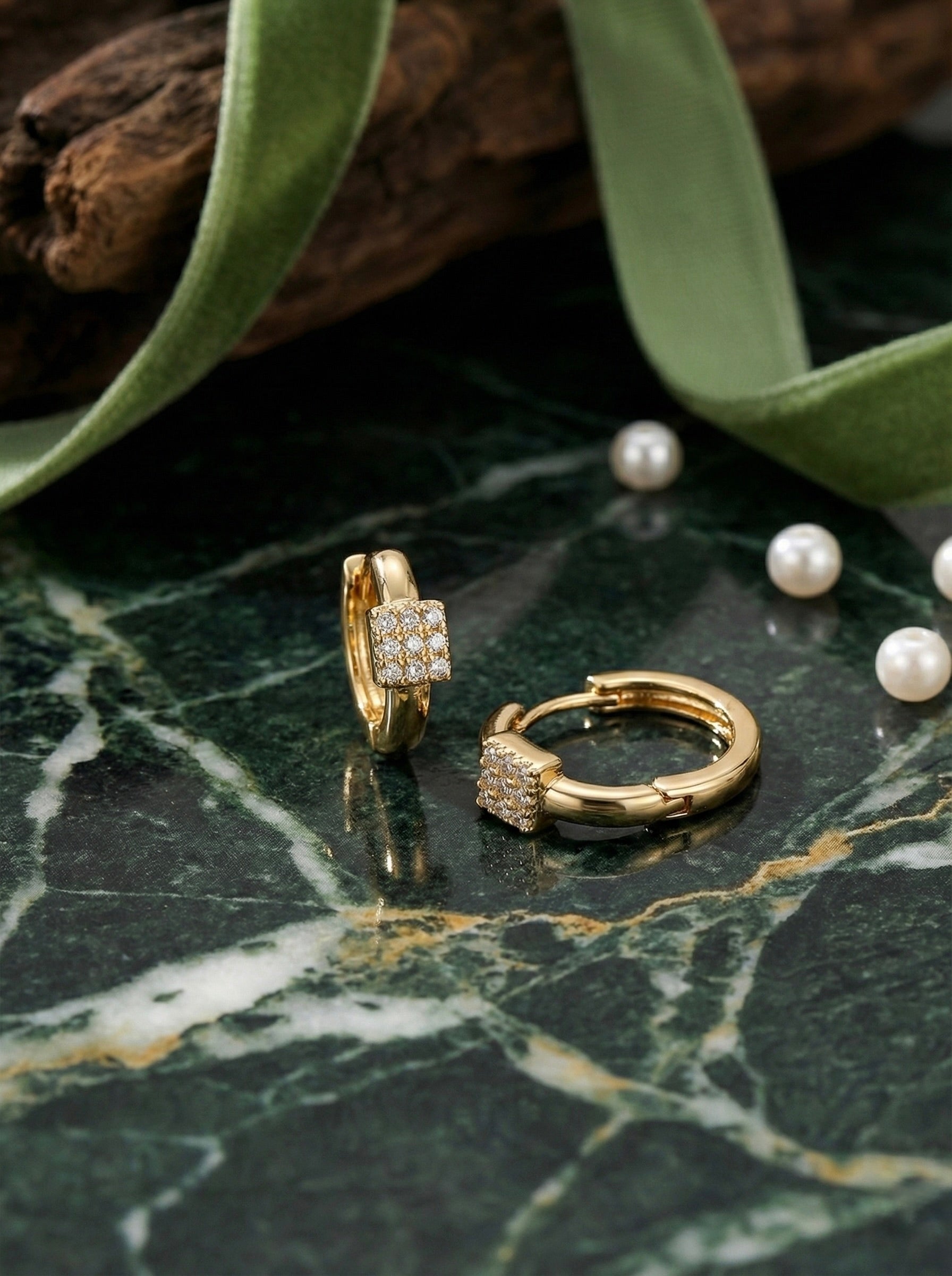 Close-up of anti-tarnish crystal gold small hoop earrings detail