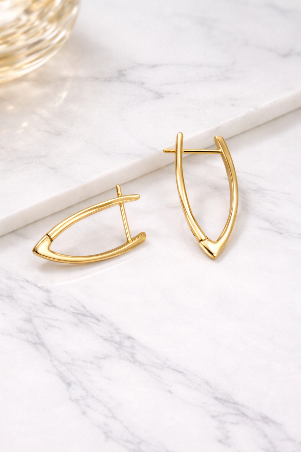 Side view of The Aura Hoops anti-tarnish minimal gold earrings for women