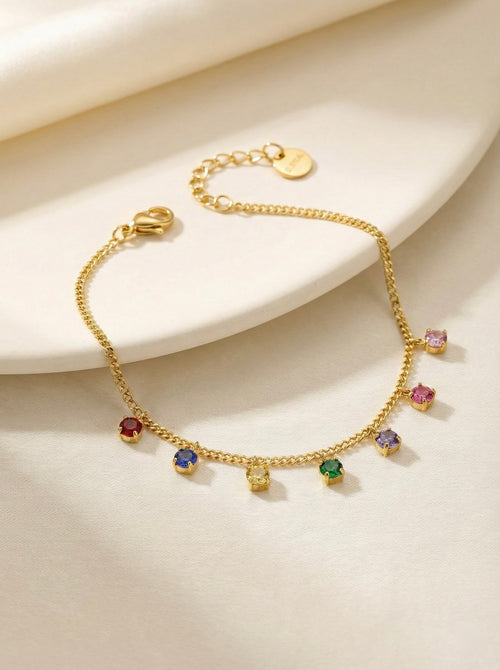 Close-up of multi-colour CZ stones on gold anti-tarnish bracelet detail