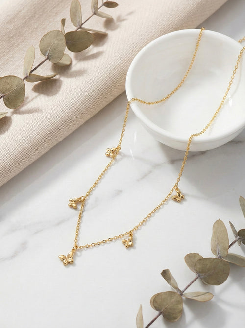 Elara butterfly charm necklace in gold with anti-tarnish finish and delicate chain design