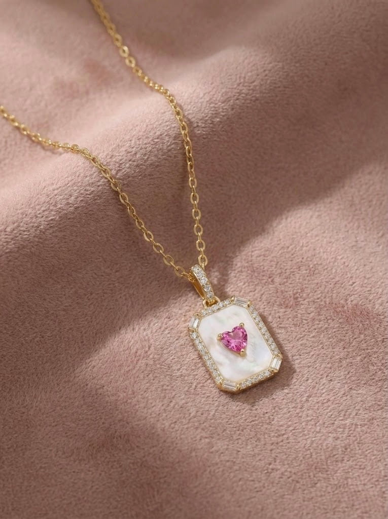 Romantic emerelle crimson heart pendant necklace styled on velvet surface for flatlay styling perfect for gifting