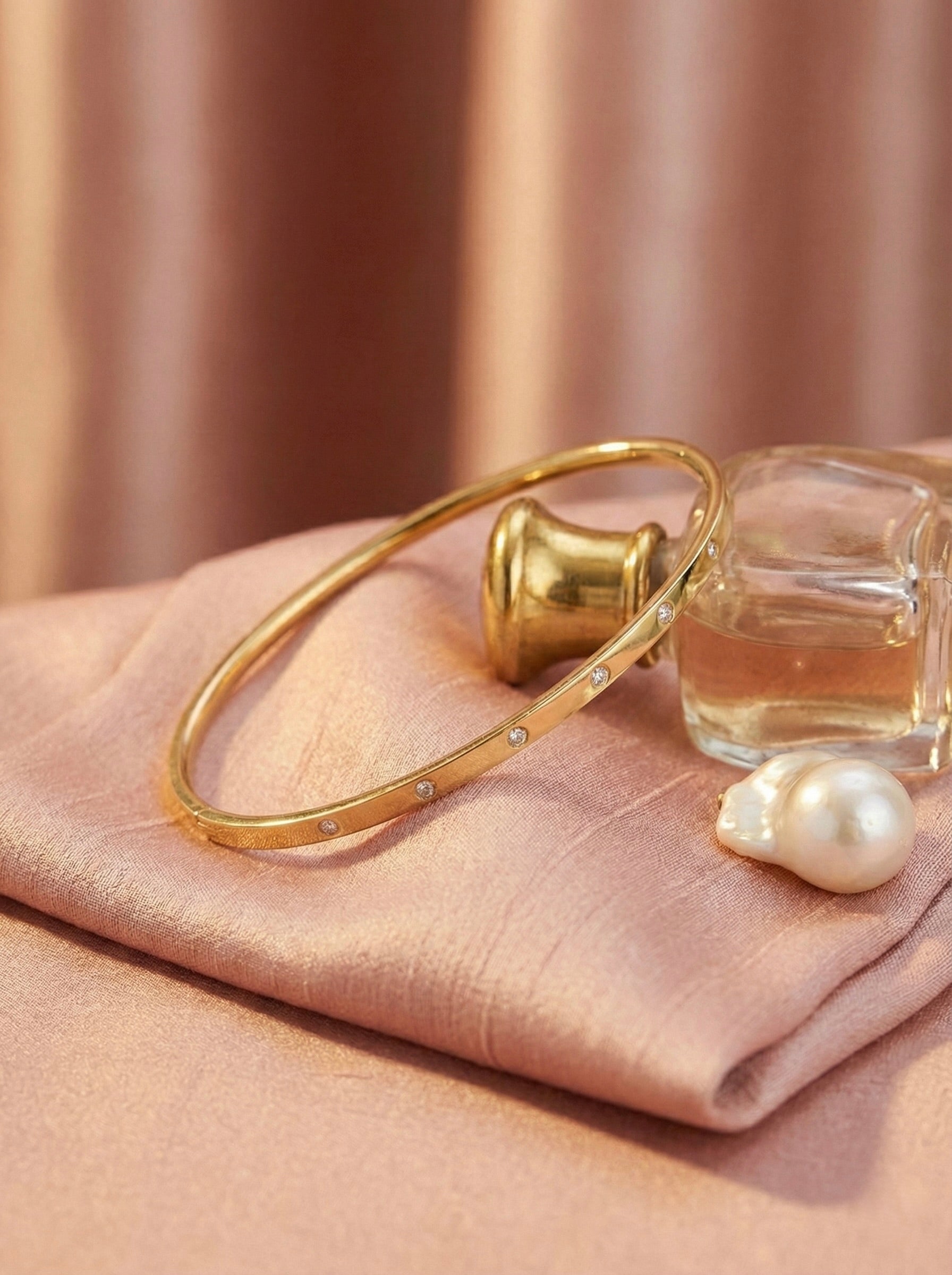 Minimal gold CZ halo bangle bracelet for everyday elegance