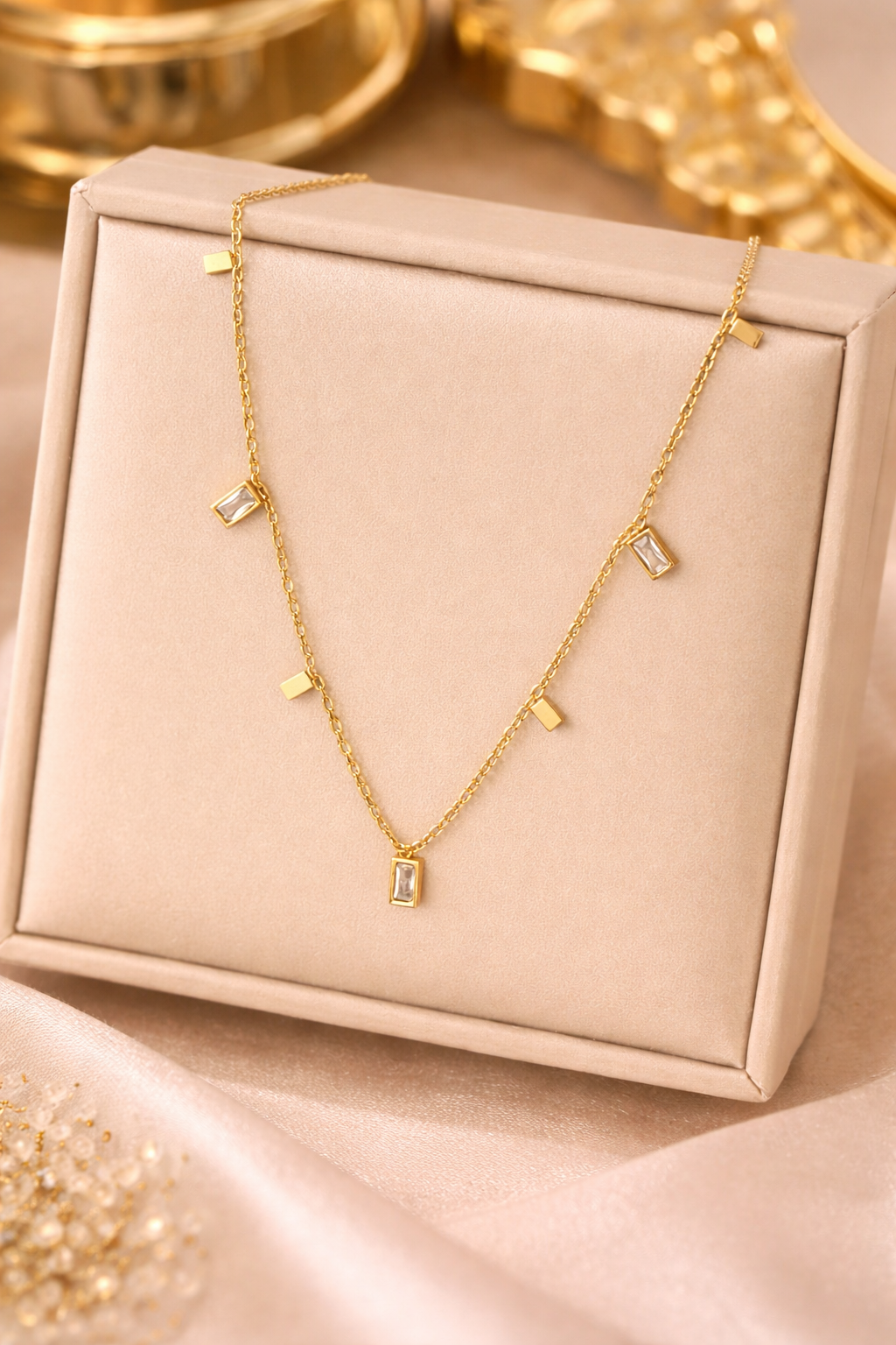 Lumera Quad Charm Necklace with rectangular crystal charms and anti-tarnish gold finish