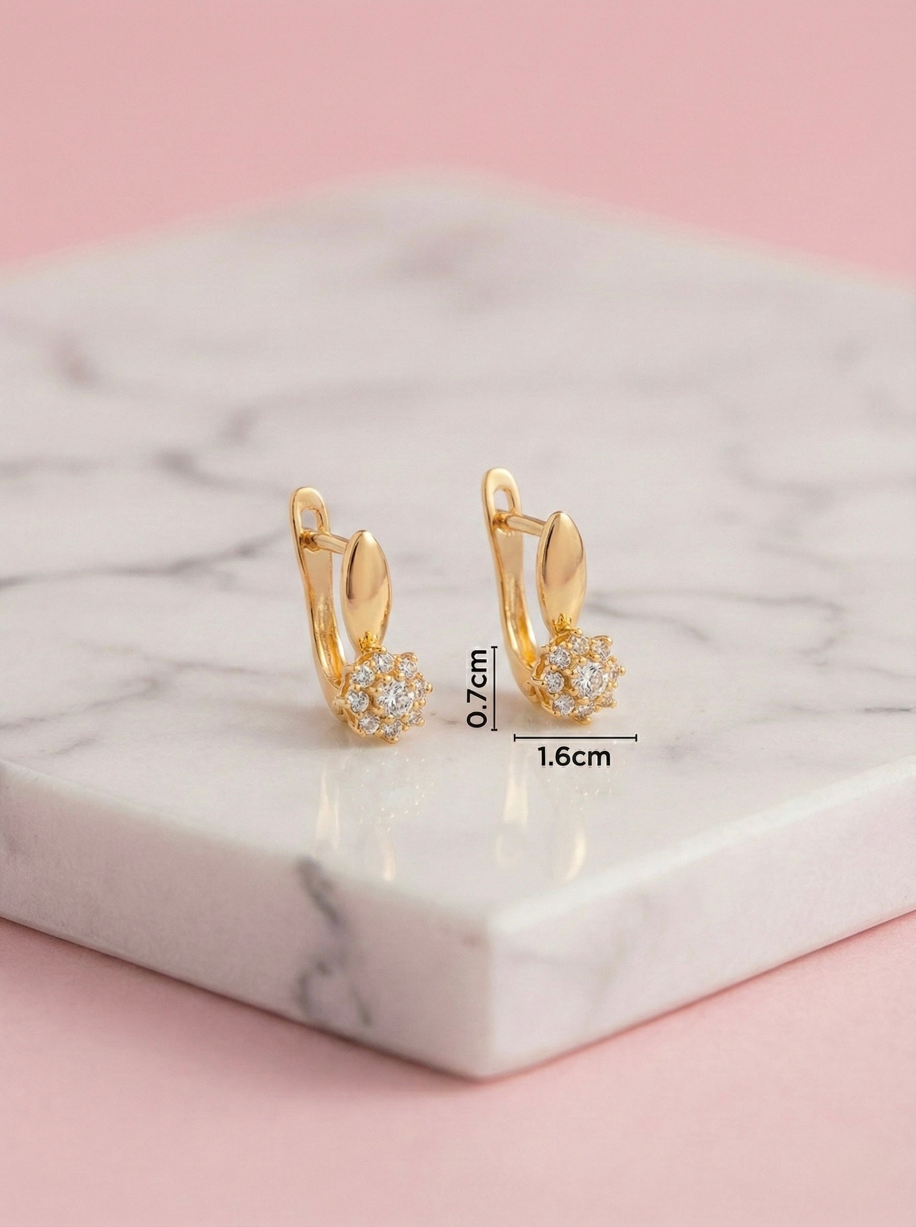 Measurements of Lumiere Huggies gold crystal cluster earrings showing dazzling detail