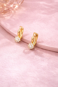 The Lumiere Huggies gold crystal cluster earrings with anti-tarnish finish for women