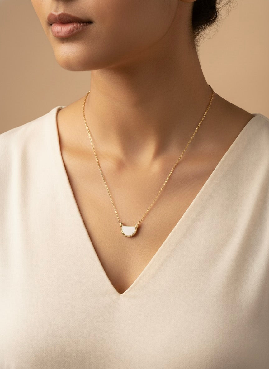 Minimal Arvella arc pendant necklace on model with office wear outfit