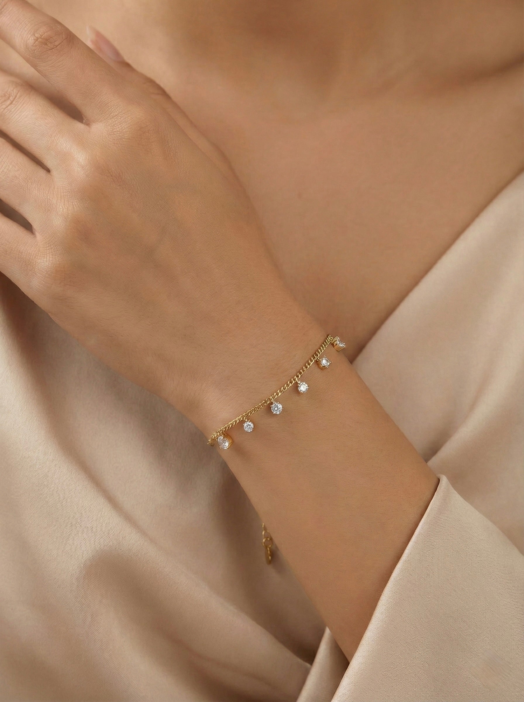 Minimal CZ drop bracelet styled on wrist for everyday elegance