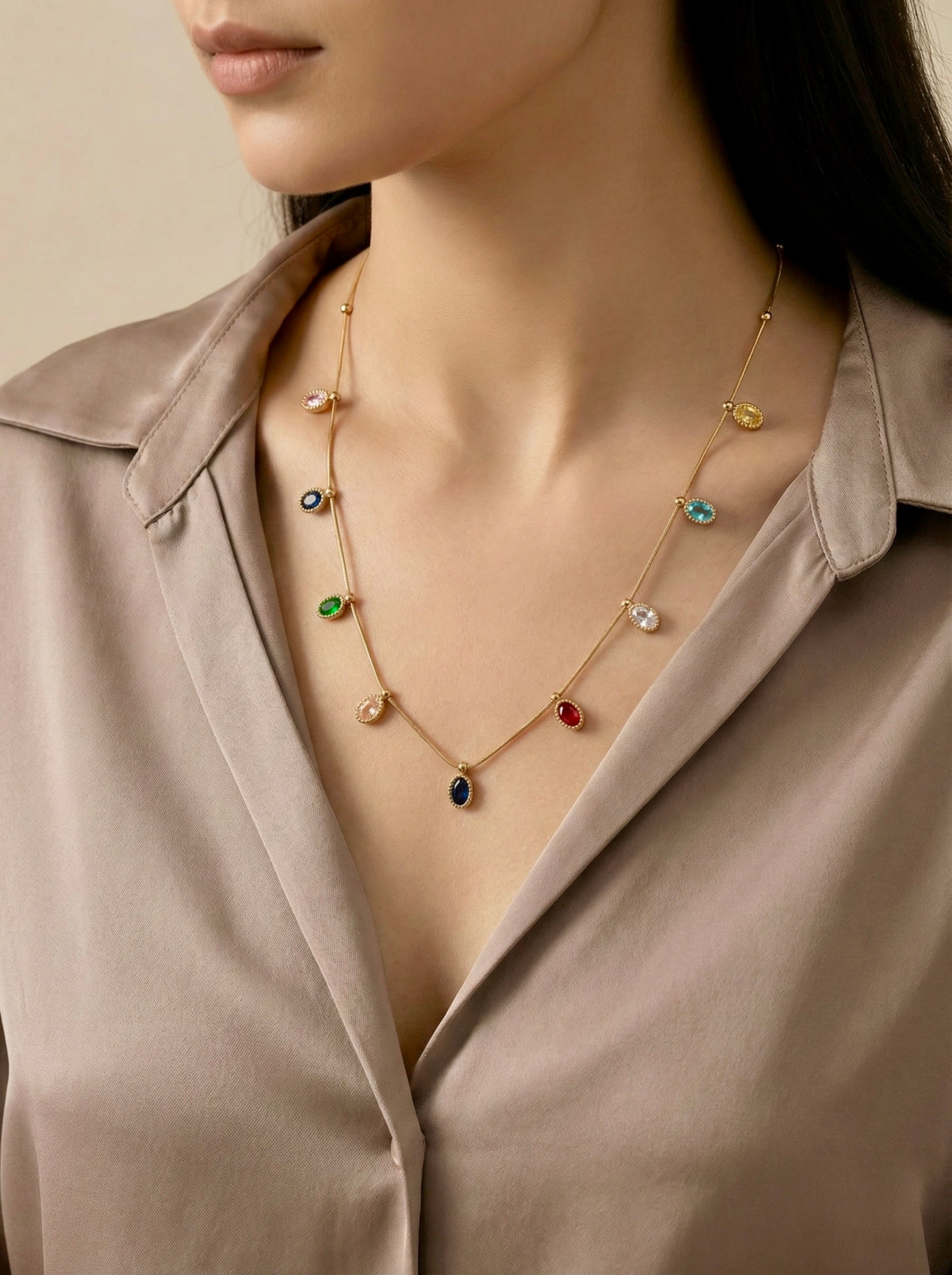 Close-up of multi-colour cubic zirconia stones on Soraya Prism necklace
