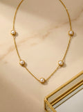 Perlisse Aura pearl station necklace in anti-tarnish gold finish for women