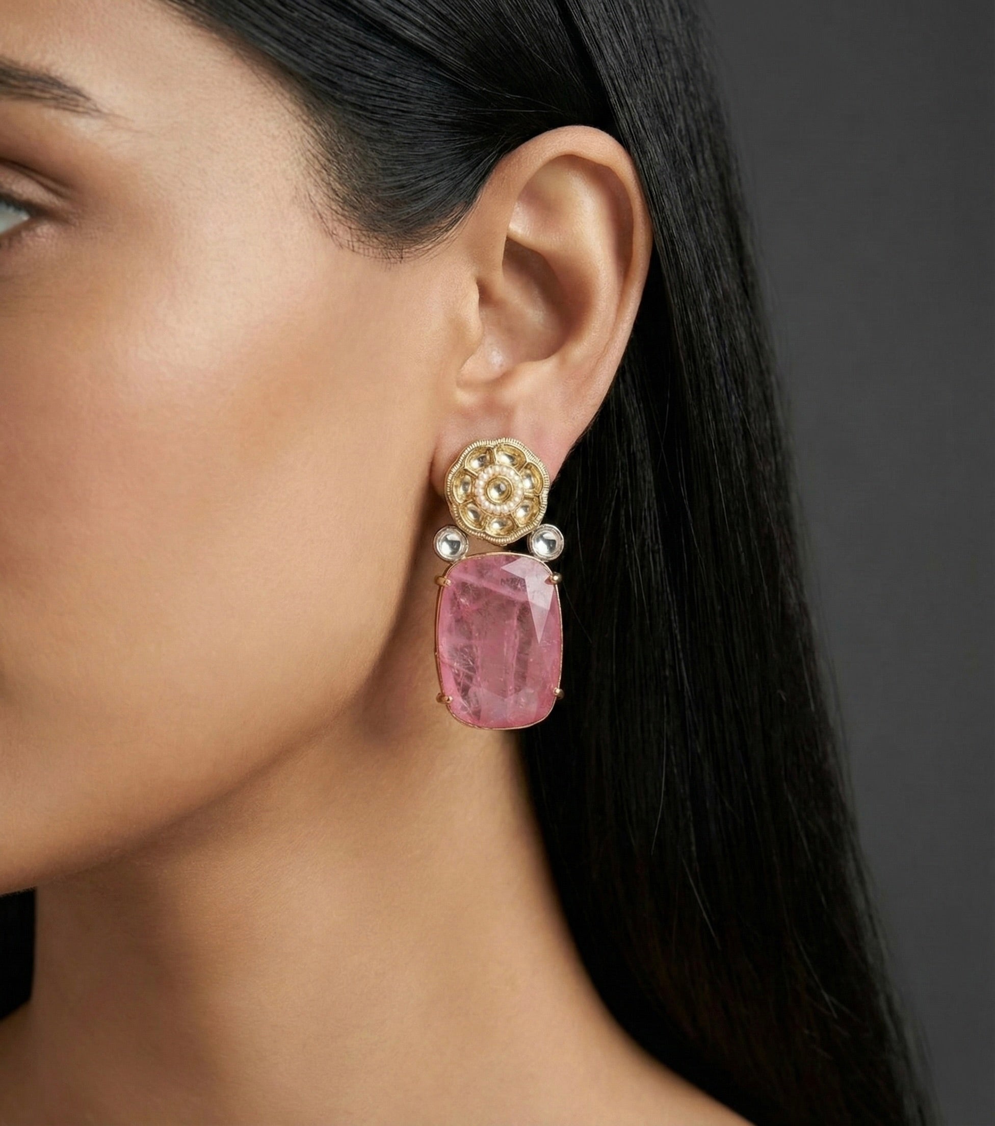 Festive Antique Gold Pink Stone Earrings on Model”