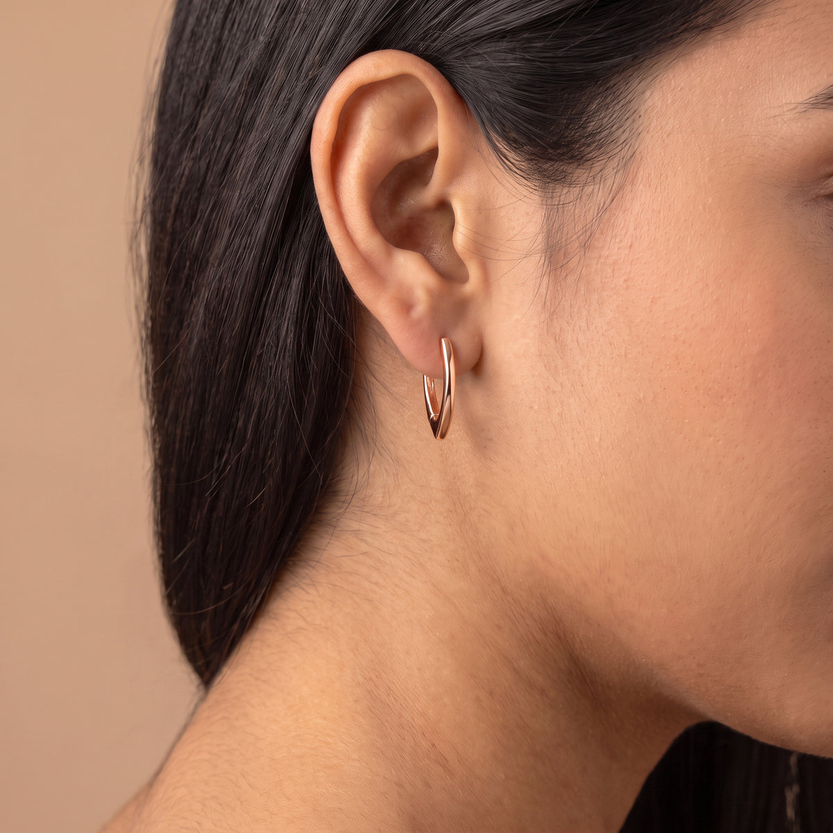 Aura V-Shape Hoop Earrings - Close-up on model