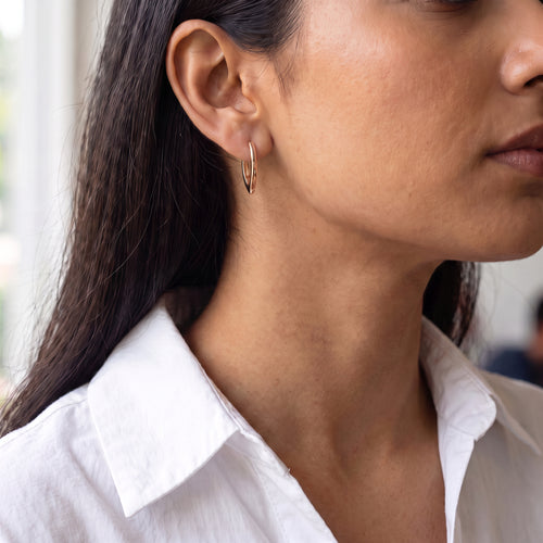 Aura V-Shape Hoop Earrings - On model