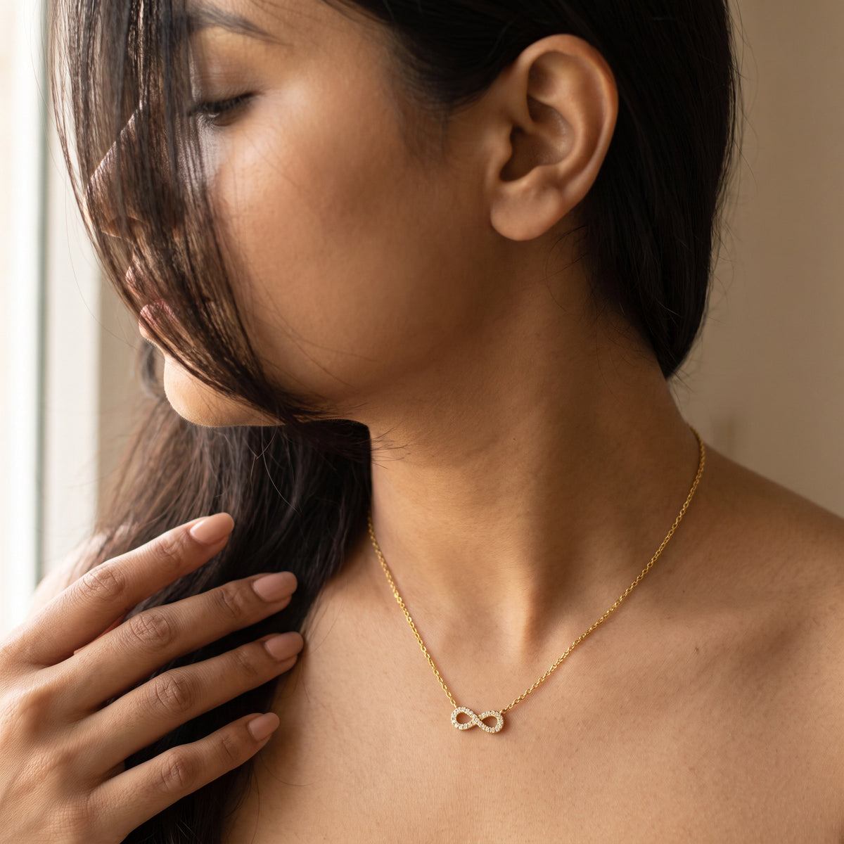 Ananta Infinity Necklace - Close-up on model