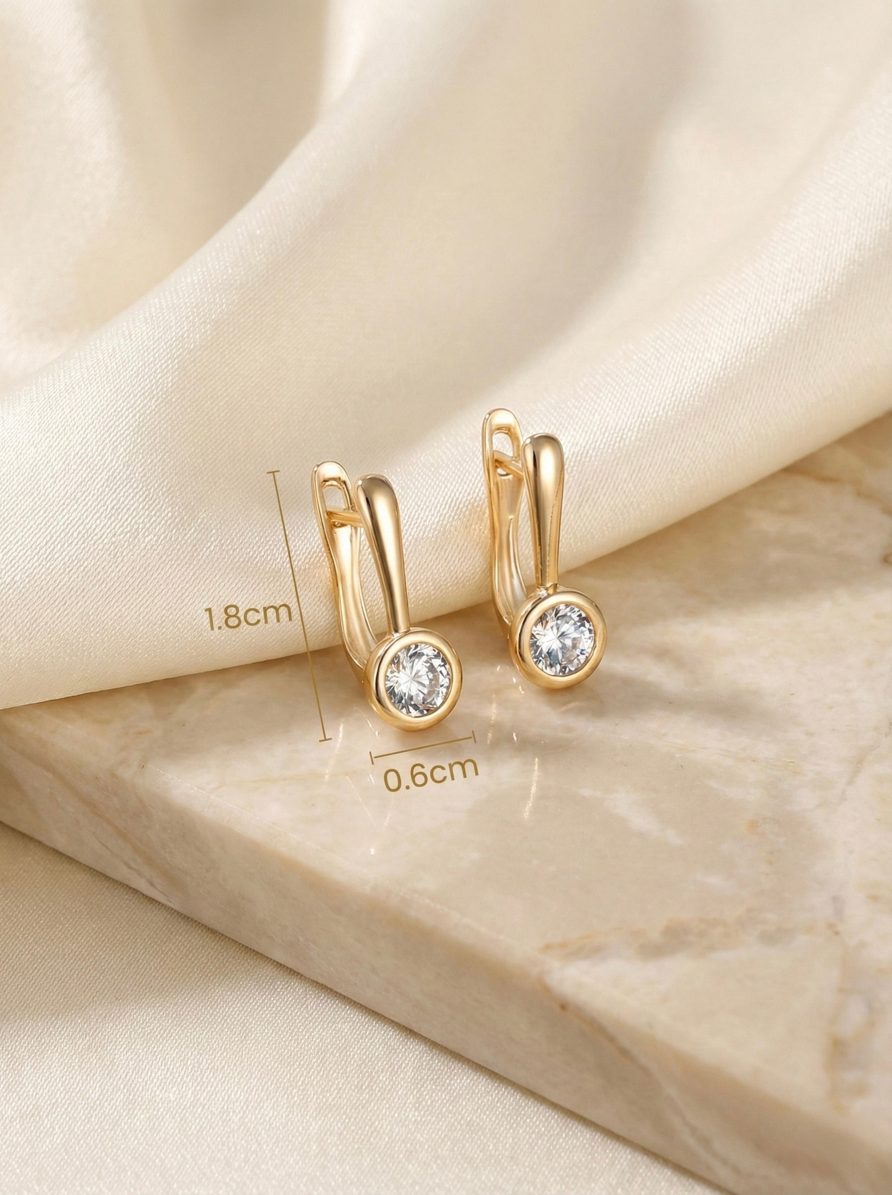 Measurements of Solis anti-tarnish gold crystal huggie earrings showing sparkling accents