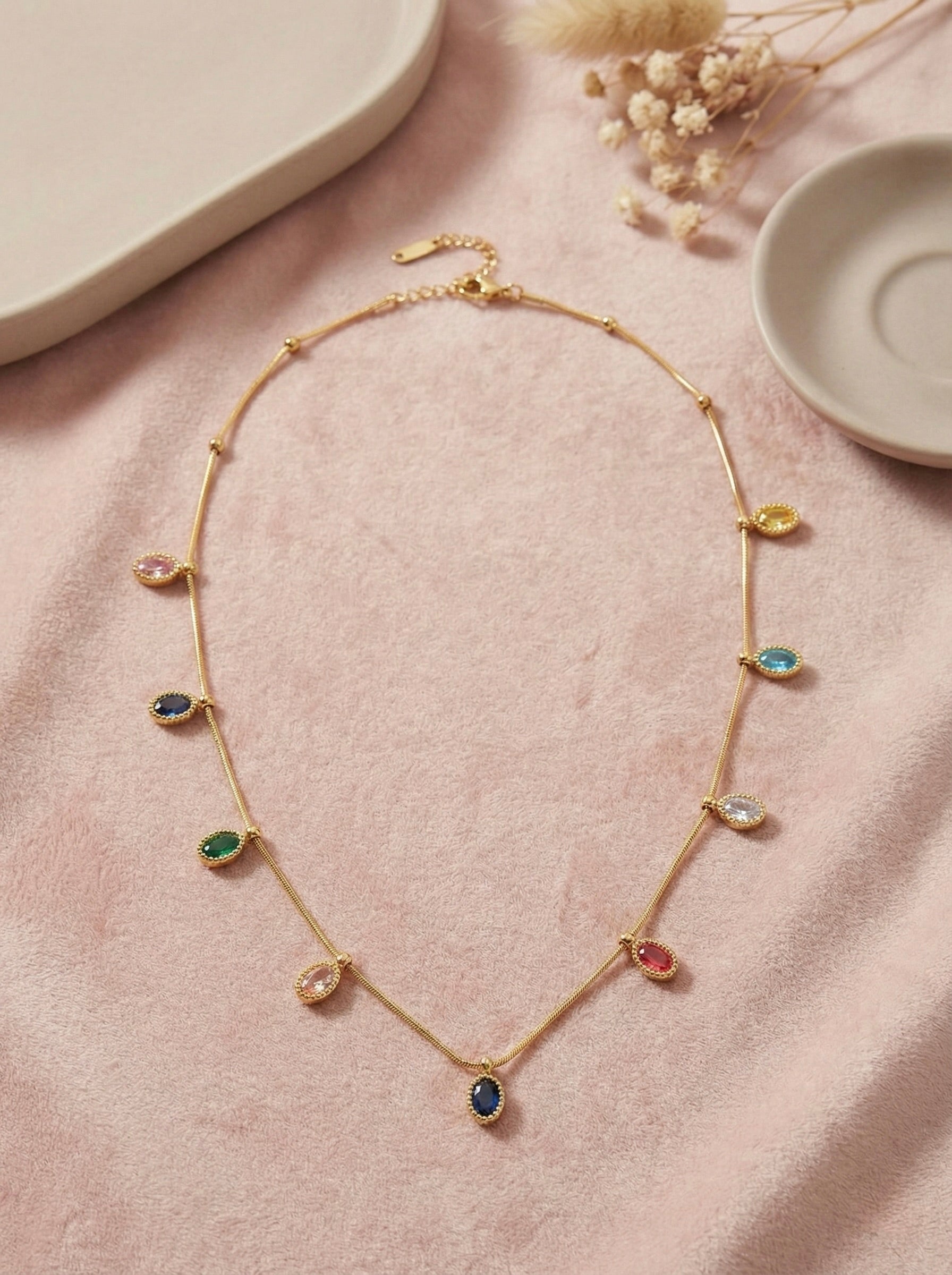 Close-up of multi-colour cubic zirconia stones on Soraya Prism necklace