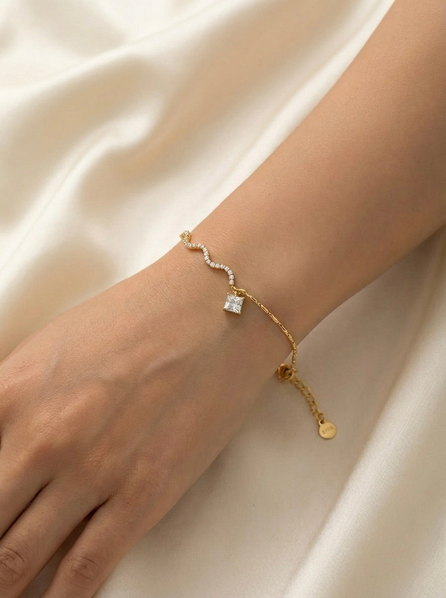 Sparkling gold CZ celestia everyday bracelet worn on wrist for evening elegance