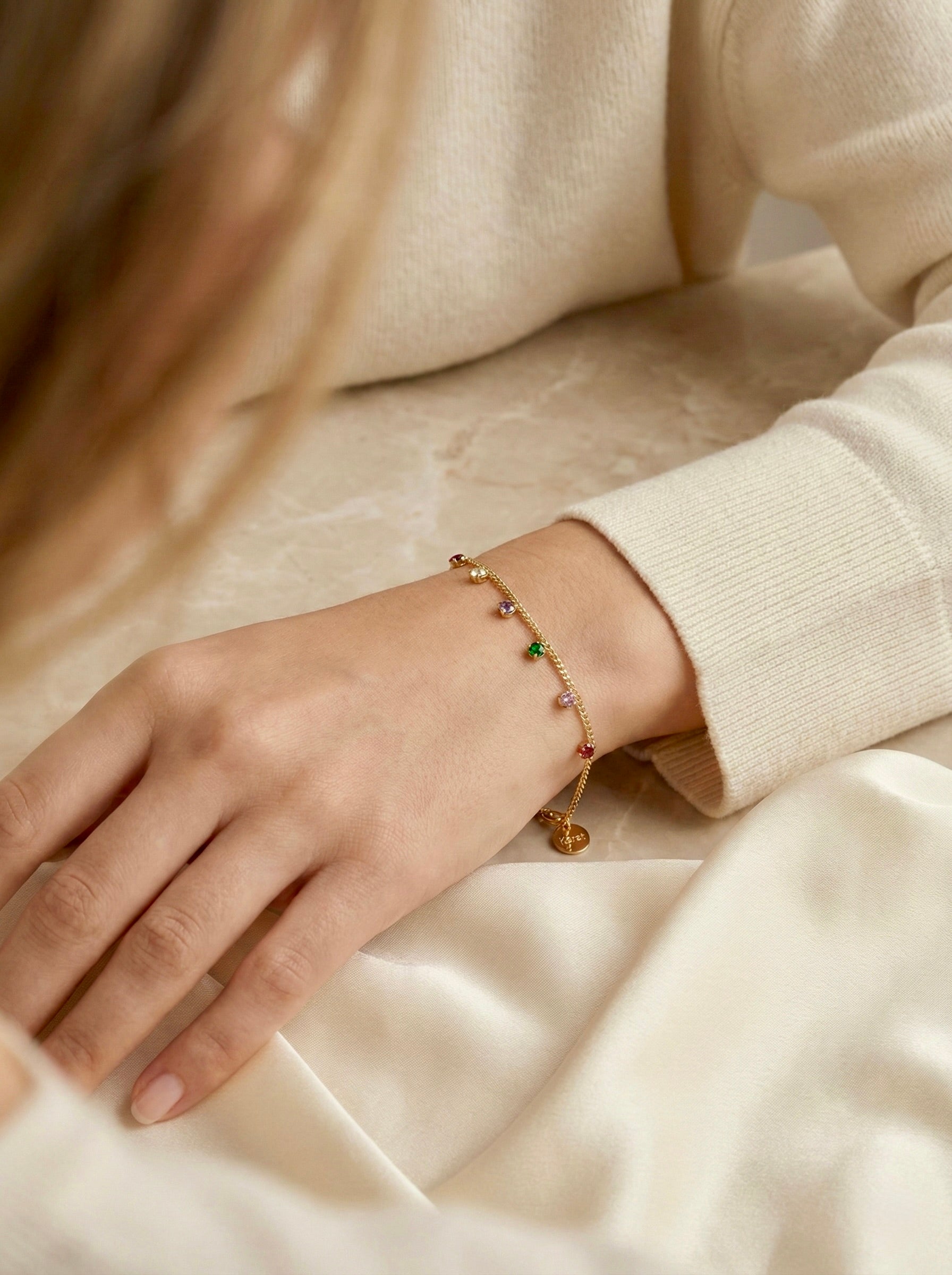 Sparkling multi-colour CZ aurielle prismcharm bracelet styled with minimal outfit