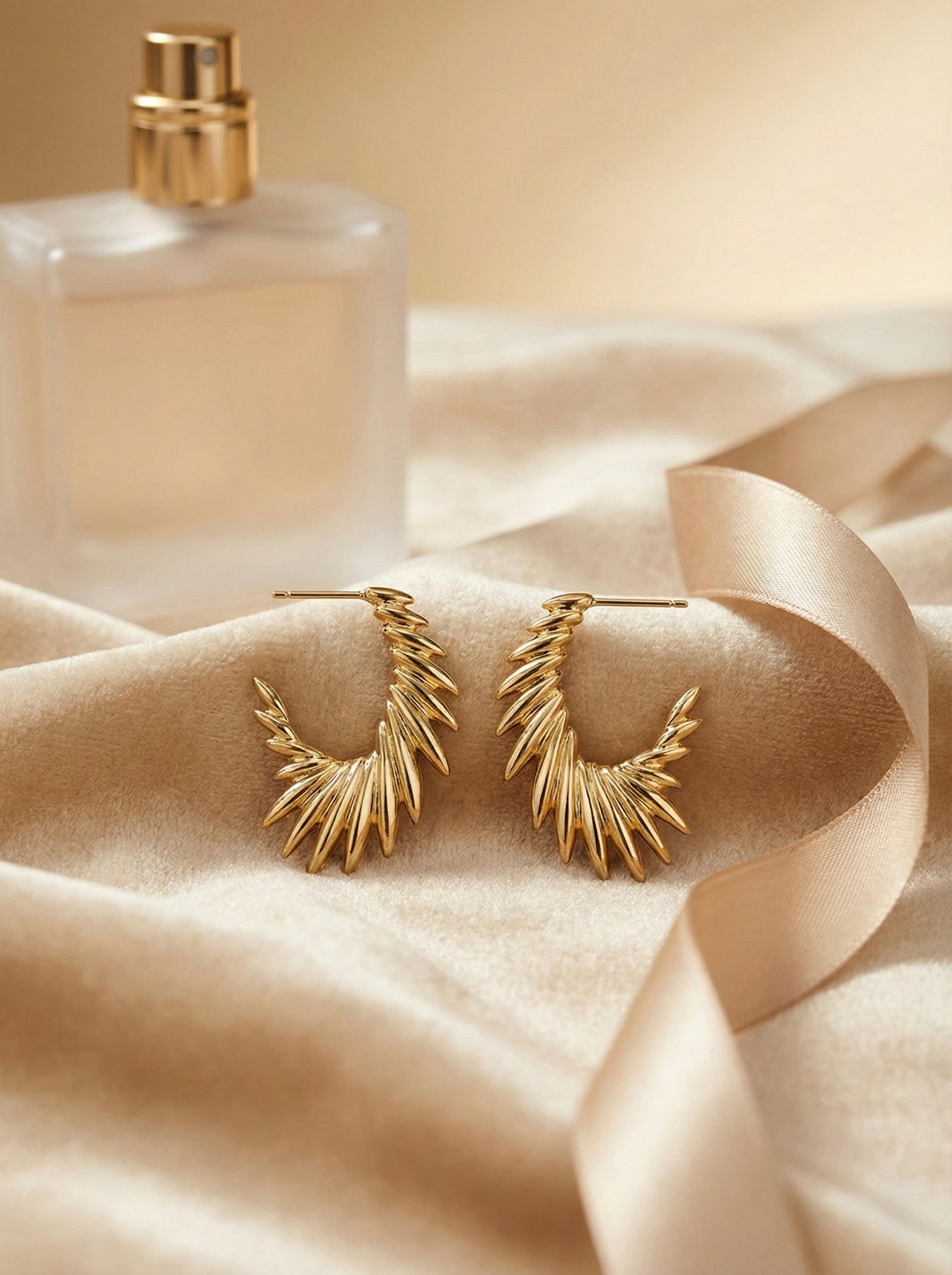 Zarielle Sunburst gold hoop earrings with anti-tarnish finish and radiant sunburst design for women